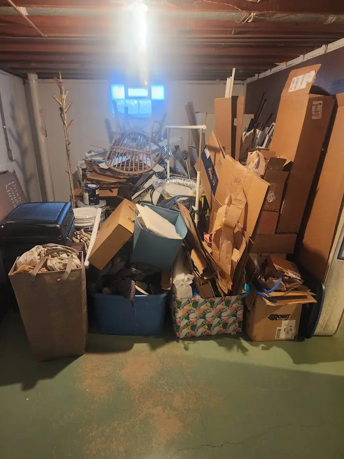 Roll-off dumpster container at job site for 2 Yard Dumpster Rental in Pleasant Run Farm